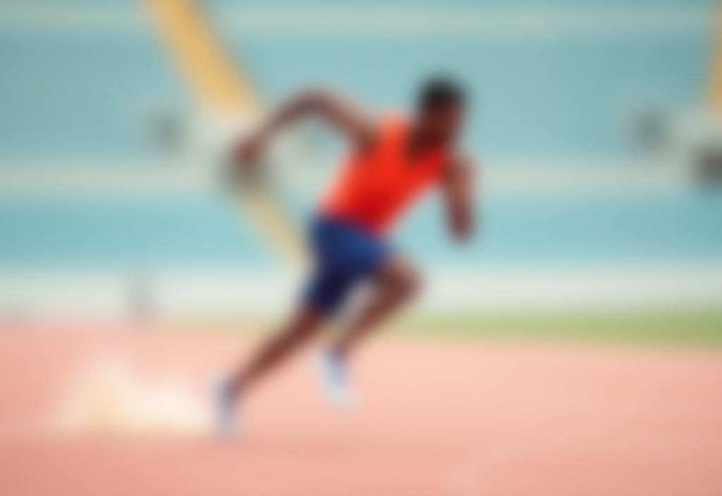 Sprinter accelerating on a track